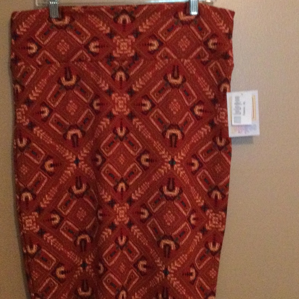 NWT Lularoe Cassie Skirt, XL. Burnt orange with black, white and jade geometric